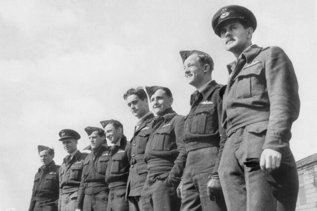 A group of pilots of No 457 (Spitfire) Squadron RAAF at RAF Station Redhill. Left to right: Sergeant Marshall Edmund Parbery, Pilot Officer D. R. Edwards, Sgt Gordon Lindsay Charles Gifford, Sgt Arthur Bolwell Burgess, Sgt Lockwood Graham Munro, Sgt Alfred Henry Blake, Sgt Thomas Findlay Clark, and Pilot Officer Alfred Glendinning. Photograph from the Australian War Memorial collection