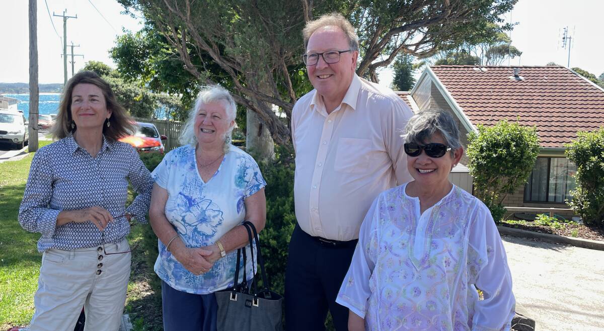 Bega Valley Shire Councillor Helen O'Neil (far left) in March 2023 when Member for Bega Dr Michael Holland committed $200,000 so that two new affordable housing units for seniors in Bermagui can go ahead without delay. Picture by Marion Williams