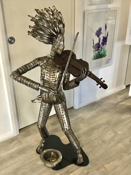 Busker, one of Paul Dimmer's distinctive sculptures. Picture supplied
