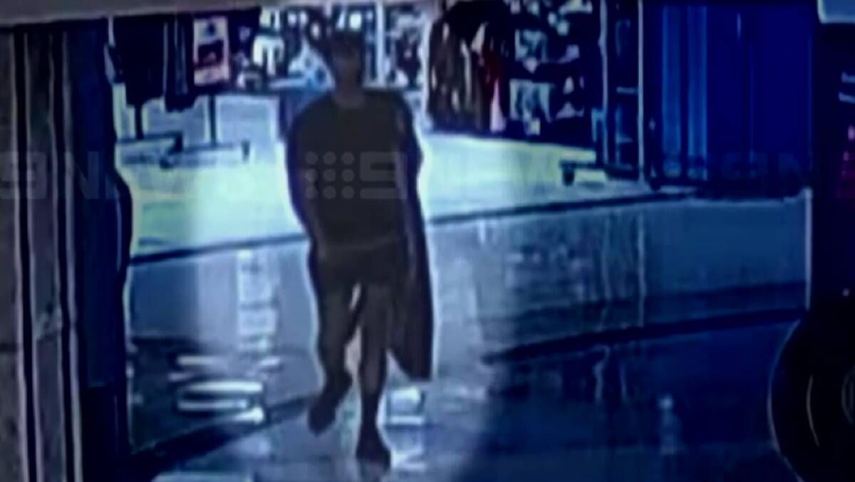 Beau Lamarre-Condon on CCTV walking out of a sports store with a surfboard bag, hours after the alleged murders of Luke Davies and Jesse Baird. Picture by 9News