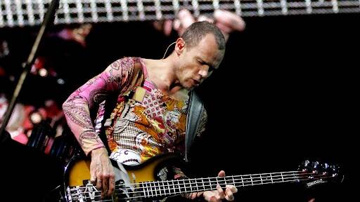 The Red Hot Chili Peppers bassist Michael 'Flea' Balzary performs on the main stage of the Rock in Rio Lisboa music festival, Portugal. Photo: Gustavo Bom