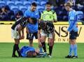 Luke Brattan of Sydney FC goes down injured during the A-League Men Elimination Final match. (Mark Evans/AAP PHOTOS)