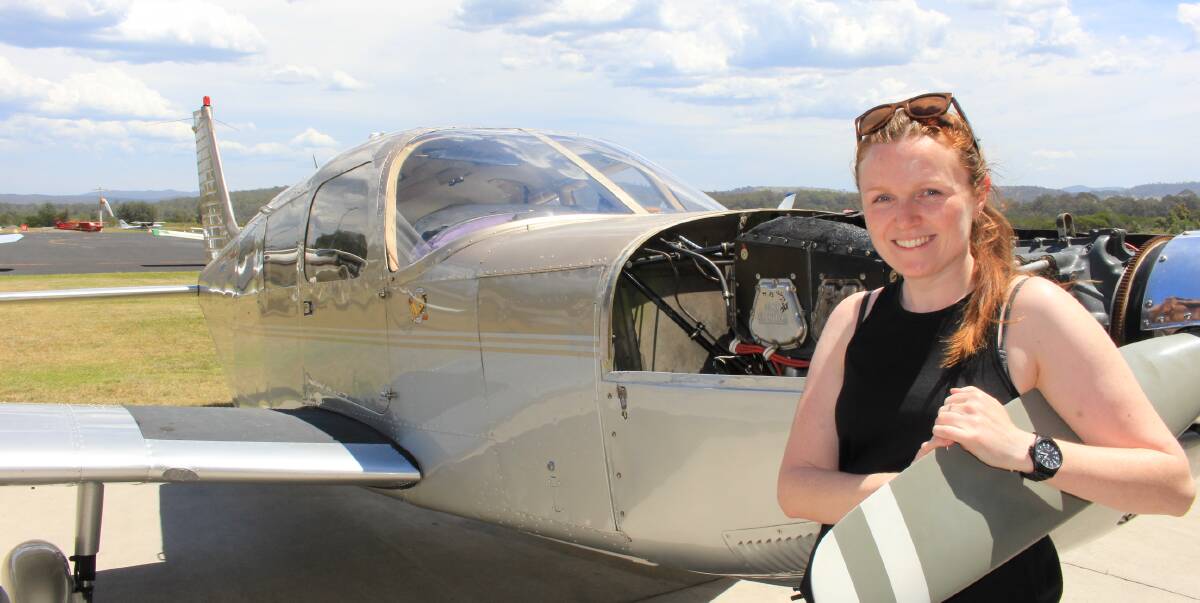 Breaking barriers: Standing with her Piper Cherokee Six, Merimbula pilot Laura Koerbin is excited to help teach female pilots from all over Australia some basic aircraft maintenance. Picture: Melanie Leach